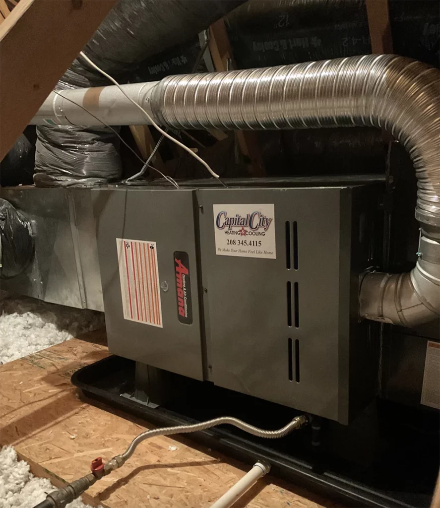 New Amana Furnace installation in roof attic of home by Capital City Heating and Air